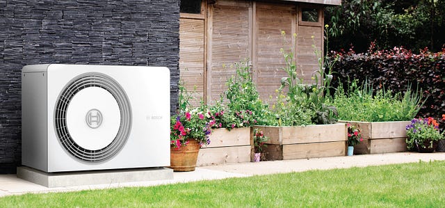 Air source heat pump unit outside a home